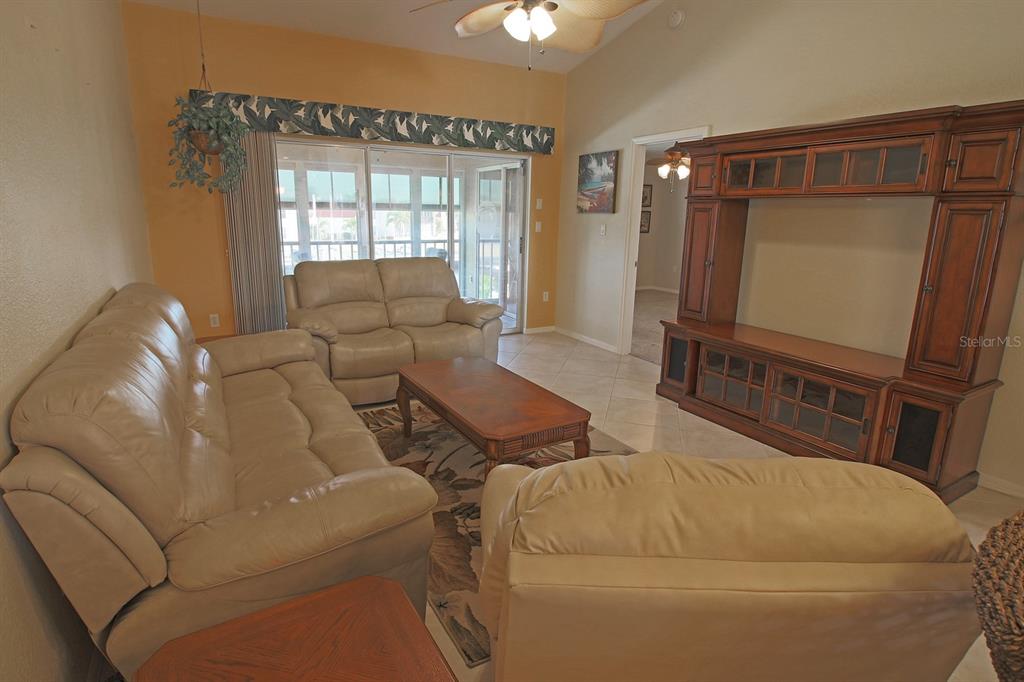 220 Coldeway Drive, Unit 123 Punta Gorda, FL 33950 - Photo 40 of 59 a living room with furniture and a window