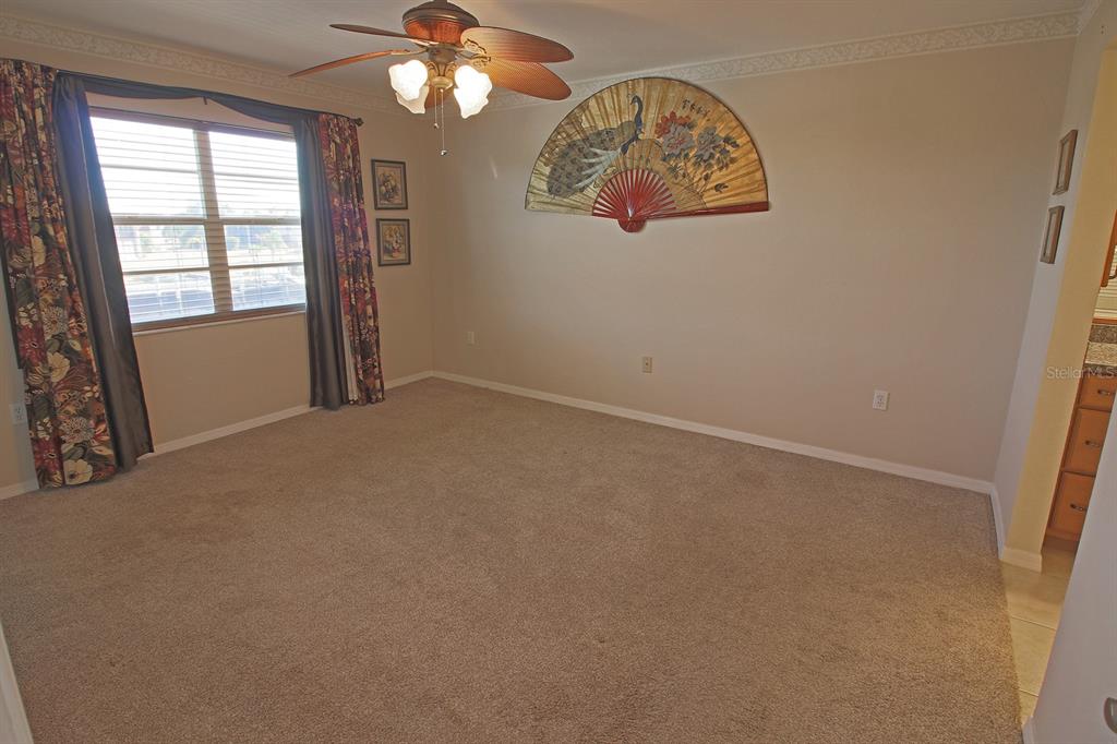 220 Coldeway Drive, Unit 123 Punta Gorda, FL 33950 - Photo 46 of 59 an empty room with a window