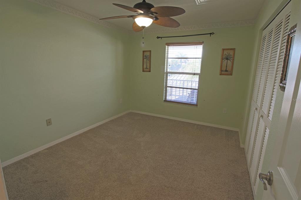 220 Coldeway Drive, Unit 123 Punta Gorda, FL 33950 - Photo 49 of 59 an empty room with a window