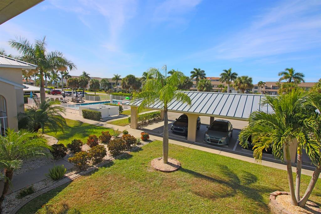 220 Coldeway Drive, Unit 123 Punta Gorda, FL 33950 - Photo 56 of 59 a view of a swimming pool with a patio