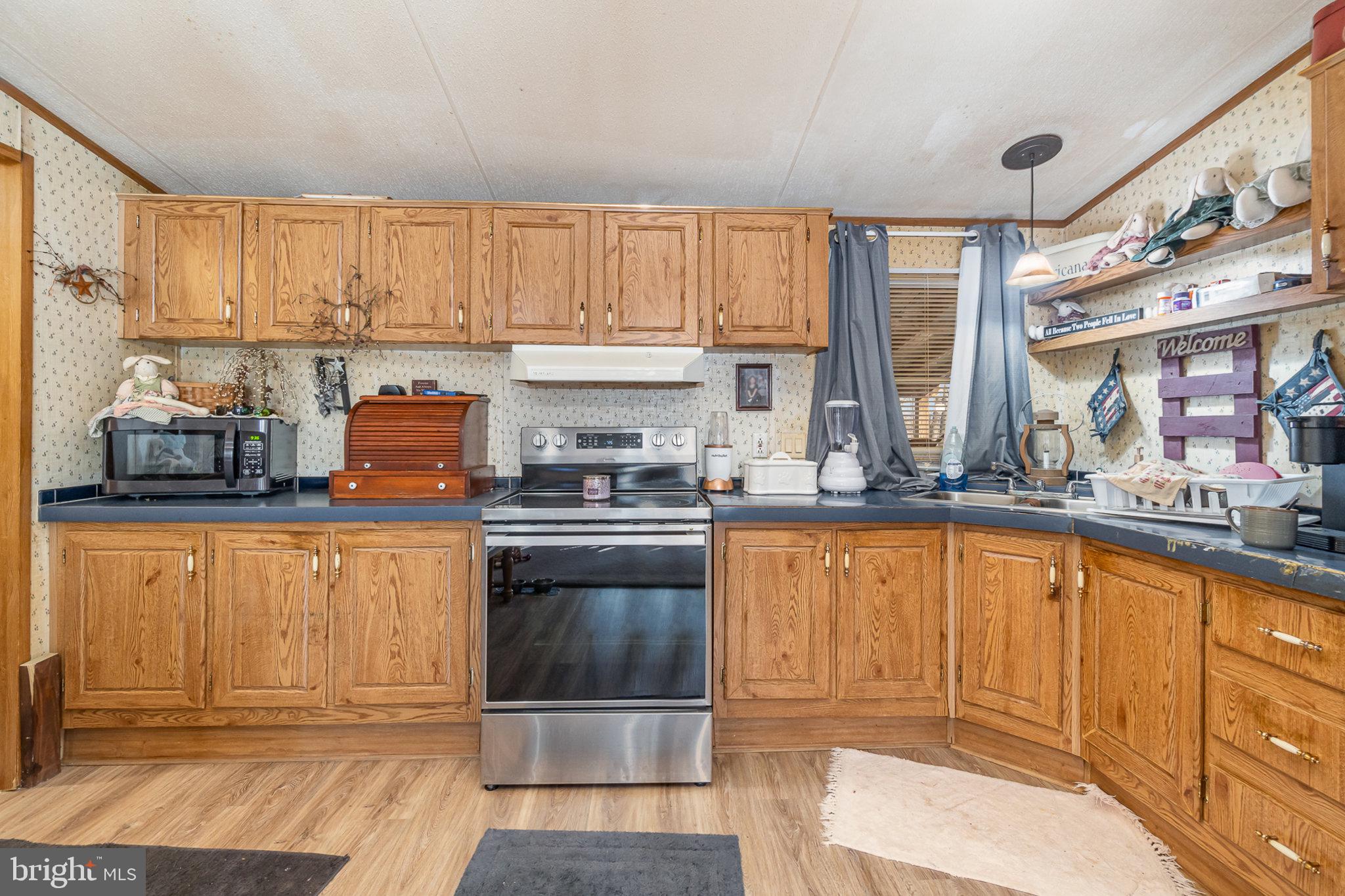 5600 Middle Ridge Road Newport, PA 17074 - Photo 17 of 56 Warm wood tones in a cozy kitchen.