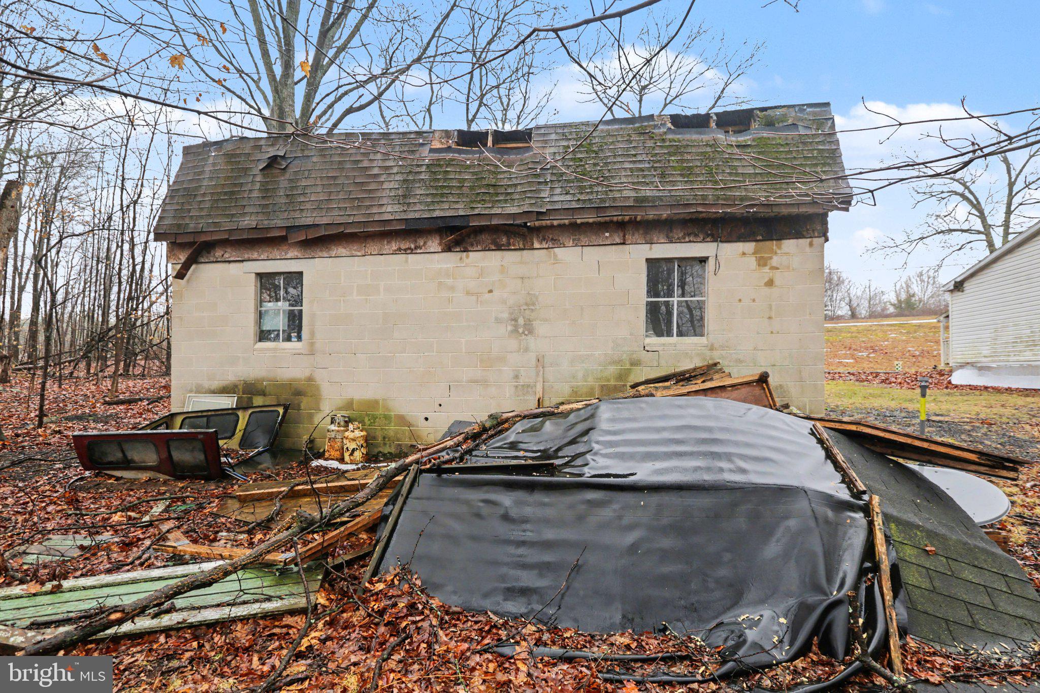 5600 Middle Ridge Road Newport, PA 17074 - Photo 33 of 56 Abandoned charm in nature's embrace.