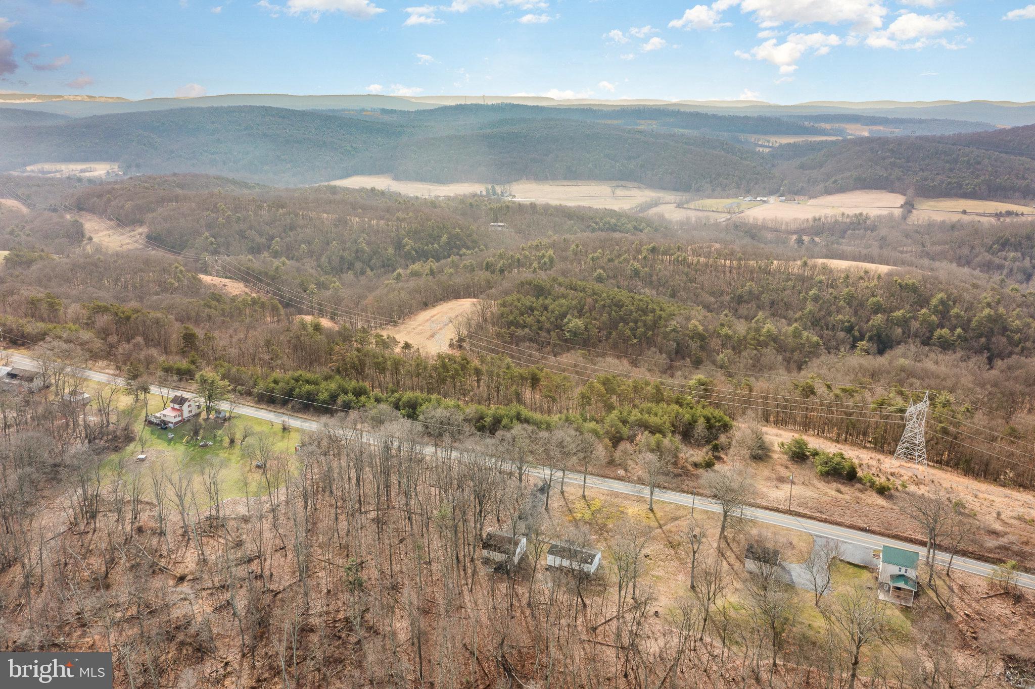 5600 Middle Ridge Road Newport, PA 17074 - Photo 46 of 56 Serene hills embrace tranquil roads.
