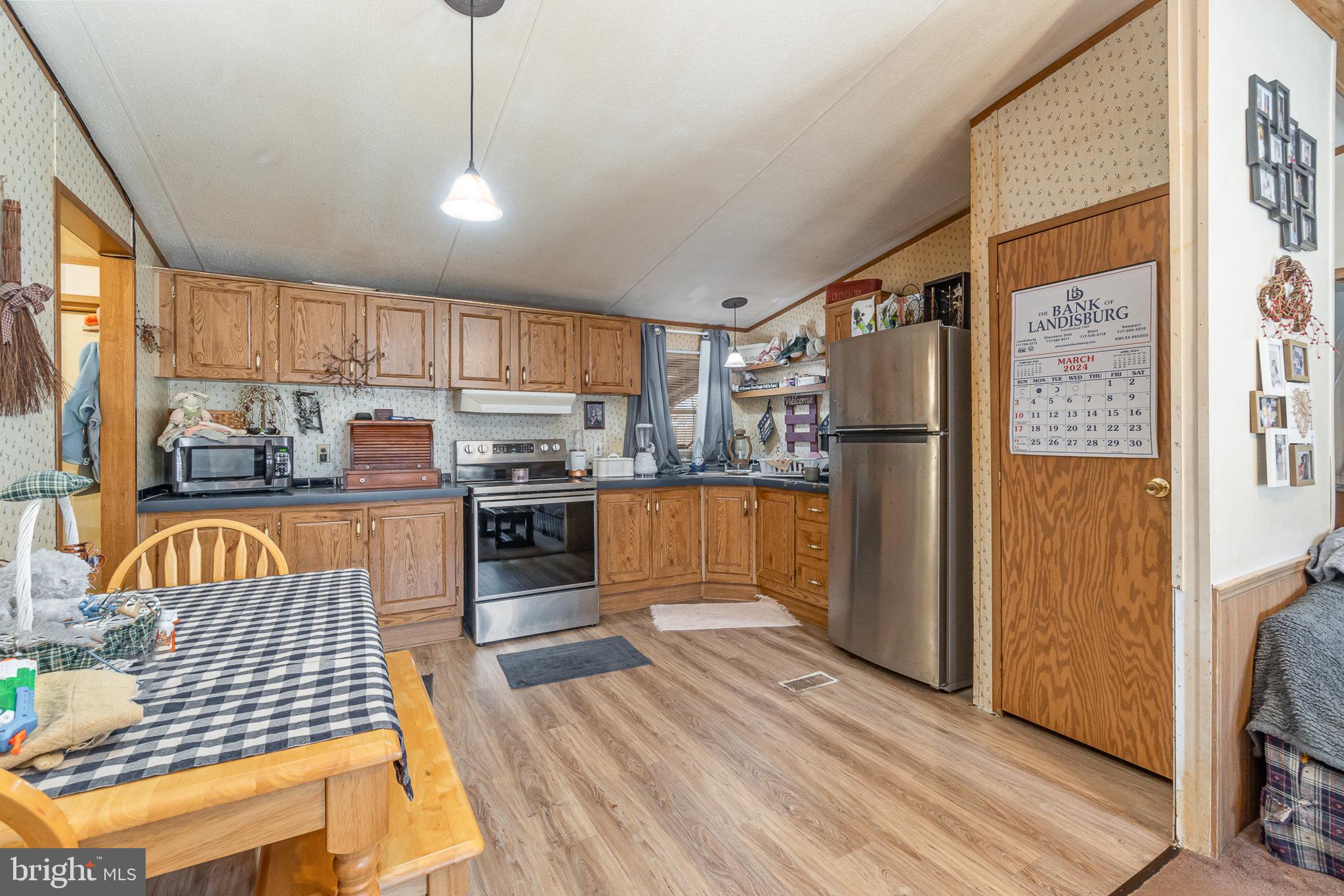 5600 Middle Ridge Road Newport, PA 17074 - Photo 6 of 56 Cozy kitchen with warm wooden tones.