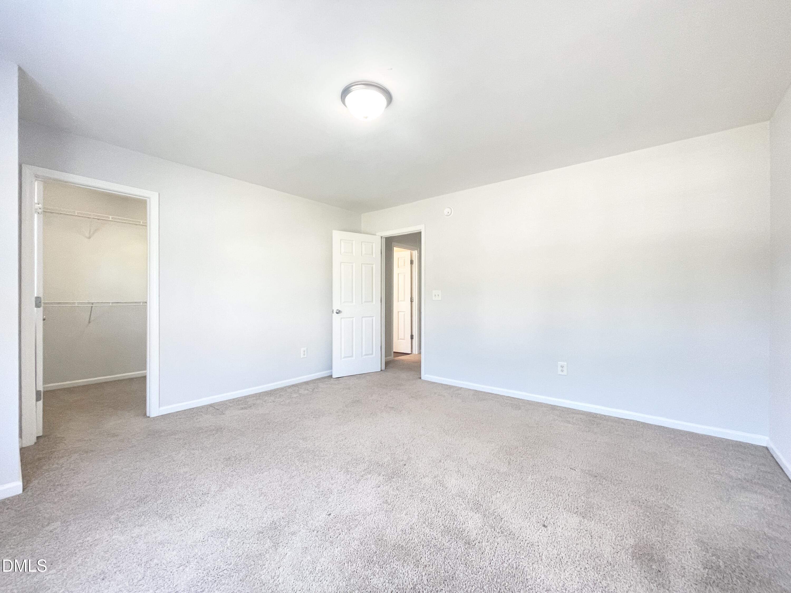 112 Taylors Creek Court Raleigh, NC 27610 - Photo 29 of 34 an empty room with an entryway