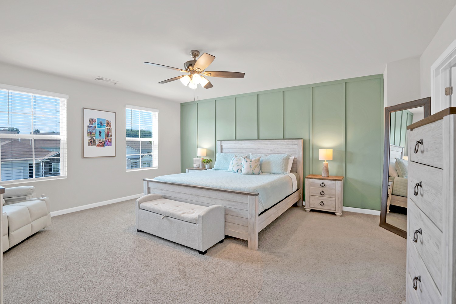 a bedroom with a bed and a couch
