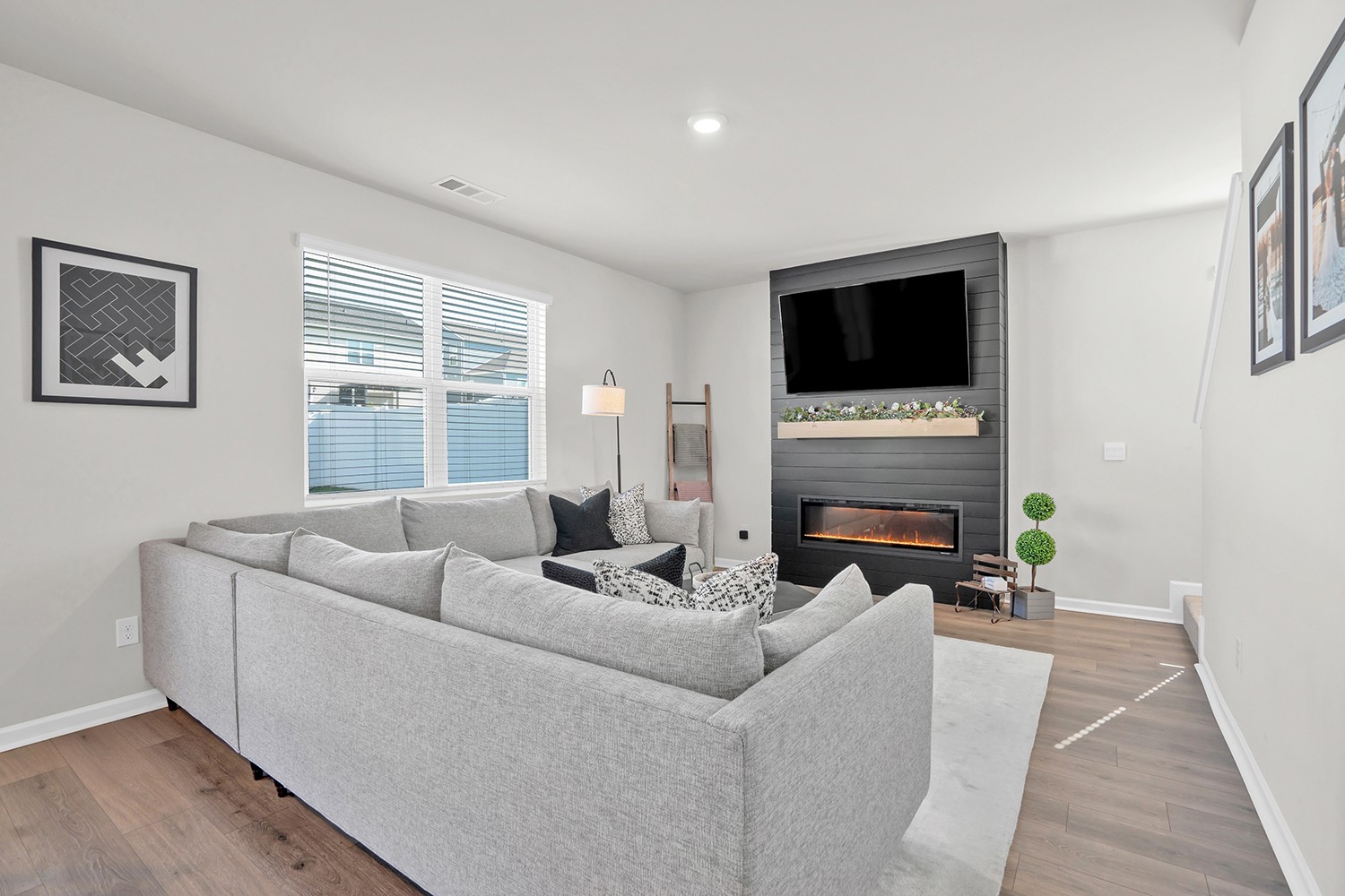 708 Pintail Pointe Lebanon, TN 37090 - Photo 11 of 41 a living room with furniture a fireplace and a flat screen tv