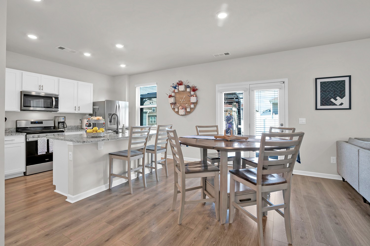 708 Pintail Pointe Lebanon, TN 37090 - Photo 12 of 41 a view of kitchen with refrigerator a dining table and chairs