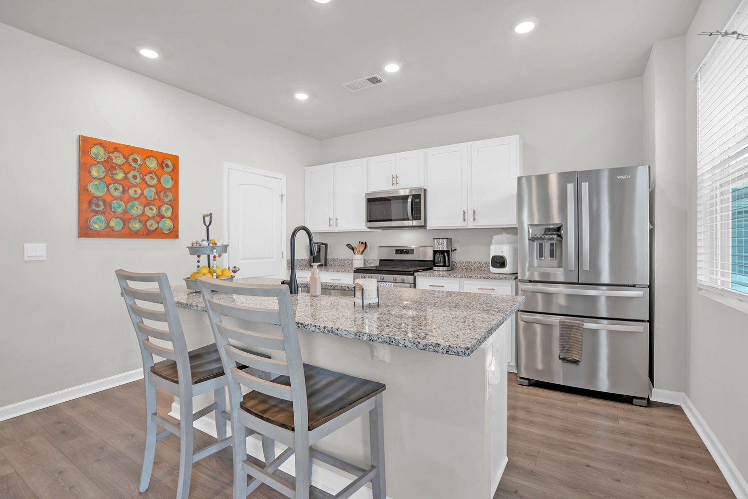 708 Pintail Pointe Lebanon, TN 37090 - Photo 15 of 41 a kitchen with a refrigerator and a stove top oven