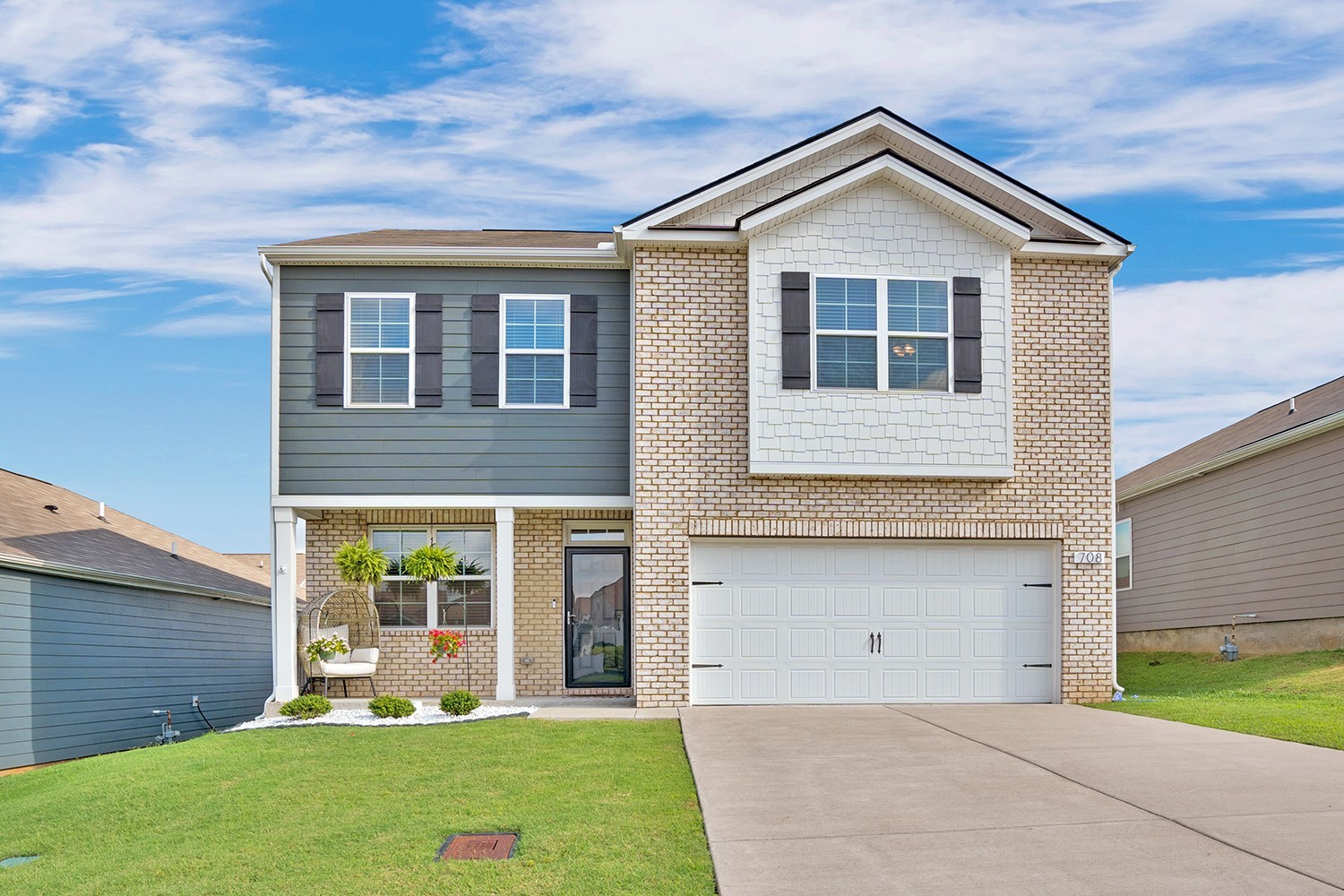 708 Pintail Pointe Lebanon, TN 37090 - Photo 2 of 41 a front view of a house with a yard and garage
