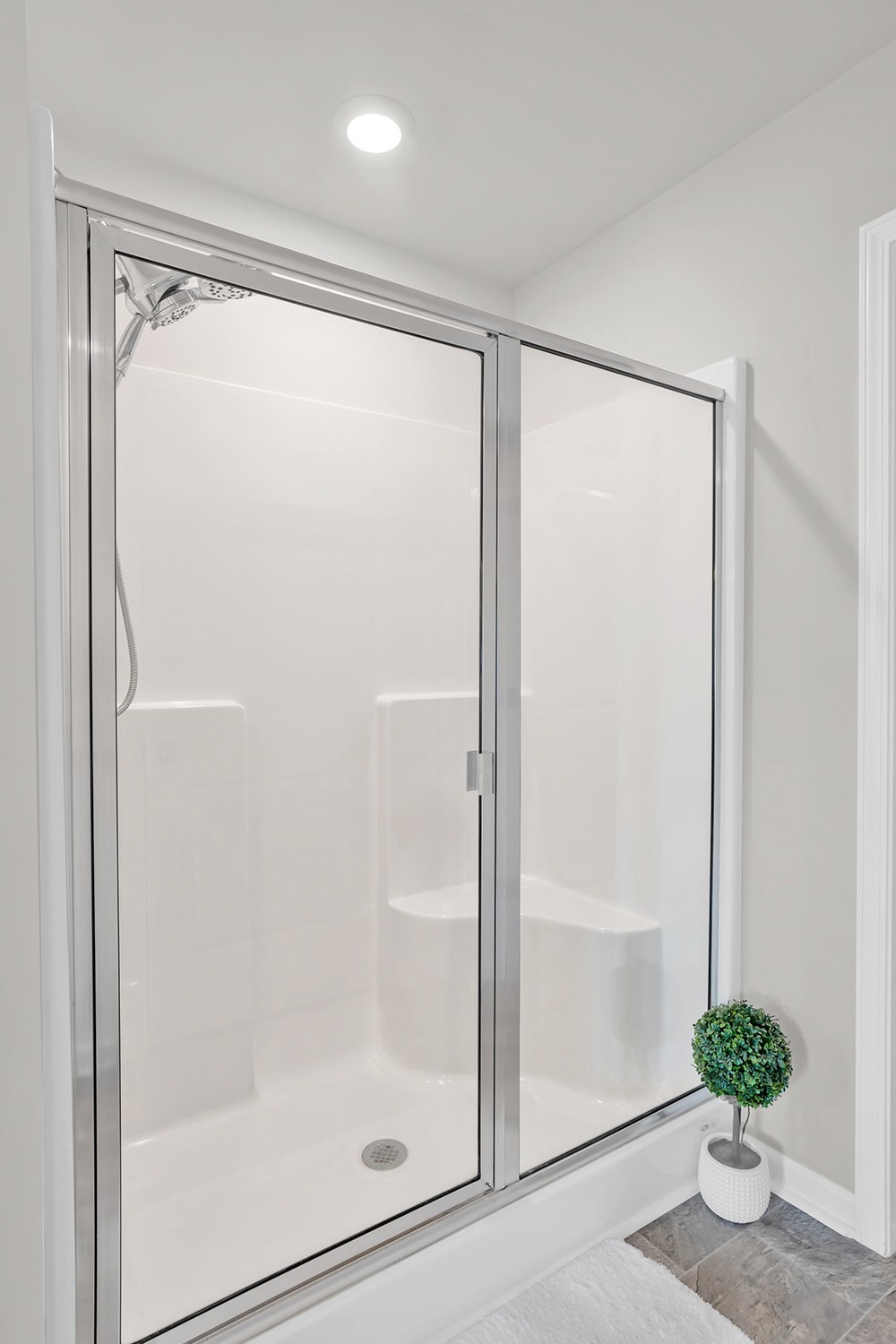 708 Pintail Pointe Lebanon, TN 37090 - Photo 22 of 41 a bathroom with a glass shower door