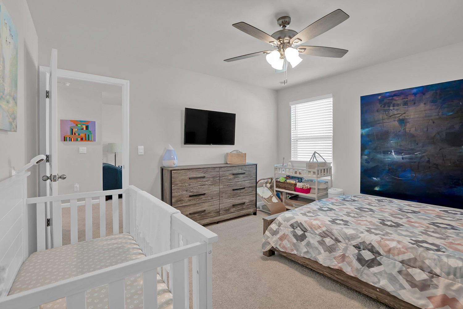 708 Pintail Pointe Lebanon, TN 37090 - Photo 28 of 41 a bedroom with furniture and a flat screen tv