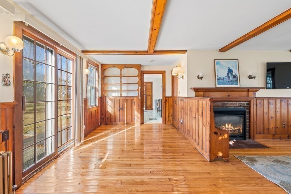 11 Russell Road Bourne, MA 02532 - Photo 8 of 16 a view of a livingroom with wooden floor and furniture