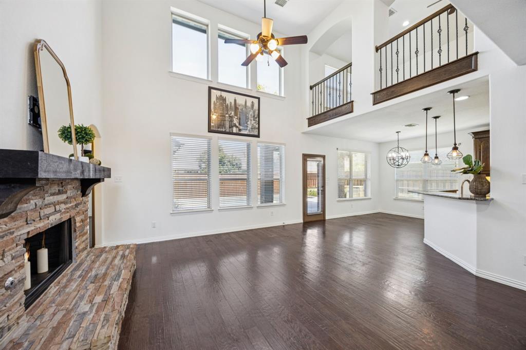 916 Redbird Lane Allen, TX 75013 - Photo 11 of 39 a view of an entryway with wooden floor