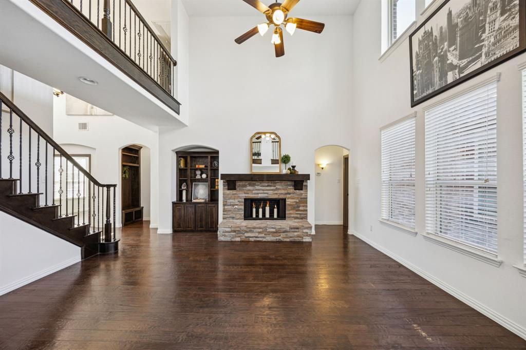 916 Redbird Lane Allen, TX 75013 - Photo 12 of 39 a view of an entryway with wooden floor