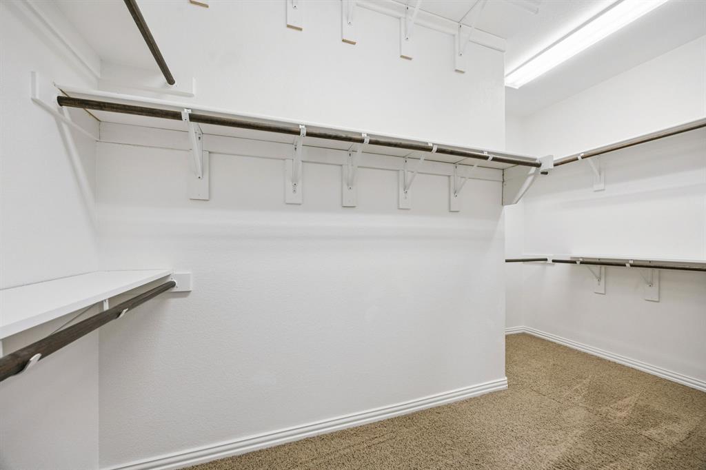 916 Redbird Lane Allen, TX 75013 - Photo 25 of 39 a view of a walk in closet