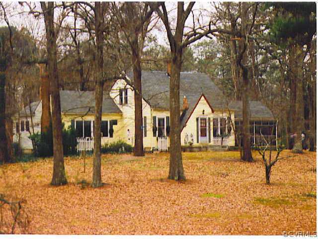4217 Cox Road Wilsons, VA 23894 - Photo 1 of 1 a front view of a house with a yard covered in snow