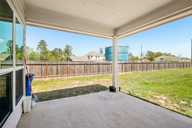 a view of swimming pool from a patio
