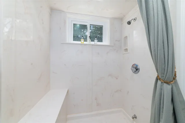 a bathroom with a window