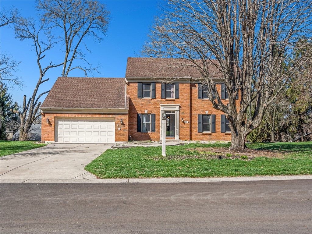 25 Callaway Springboro, OH 45066 - Photo 2 of 51 This classic brick residence features a functional garage and a neatly manicured lawn.