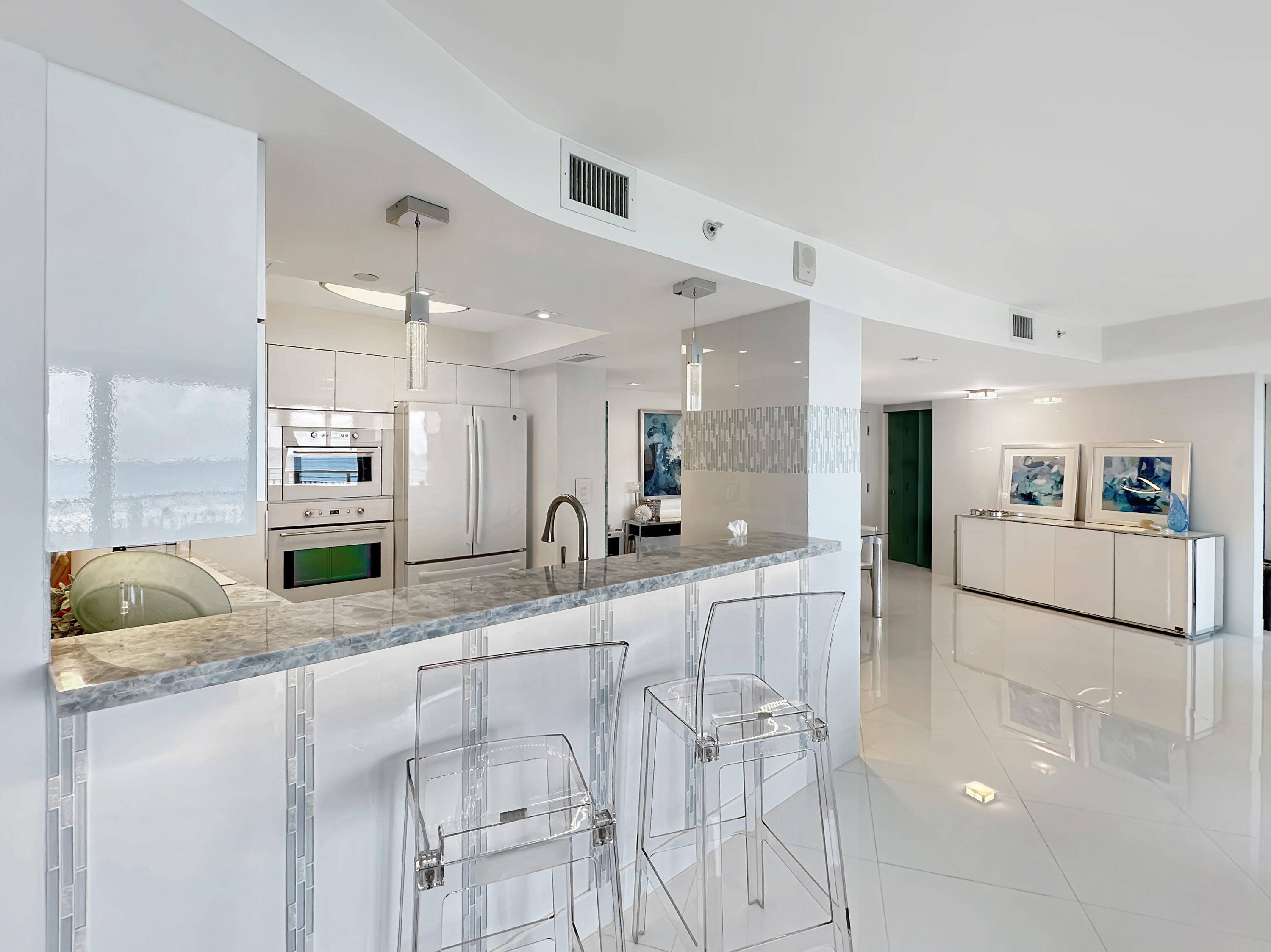 3000 North Ocean Drive, Unit 4D Singer Island, FL 33404 - Photo 8 of 58 Kitchen Pass Thru / Bar Seating