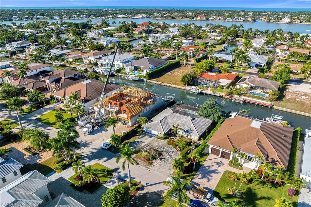 2170 Snook Drive Naples, FL 34102 - Photo 12 of 18 an aerial view of residential houses with outdoor space