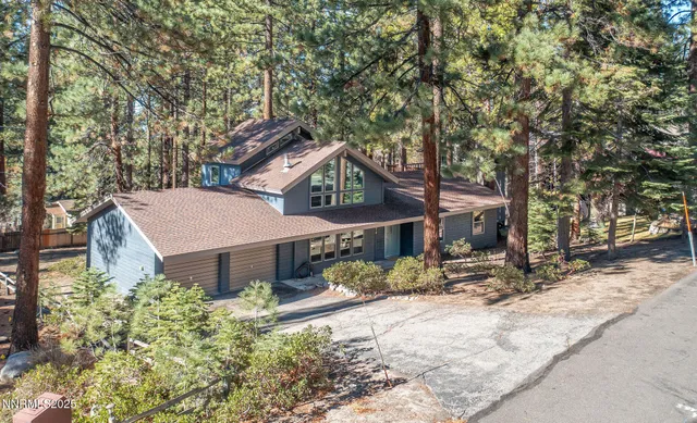 a house with trees in the background