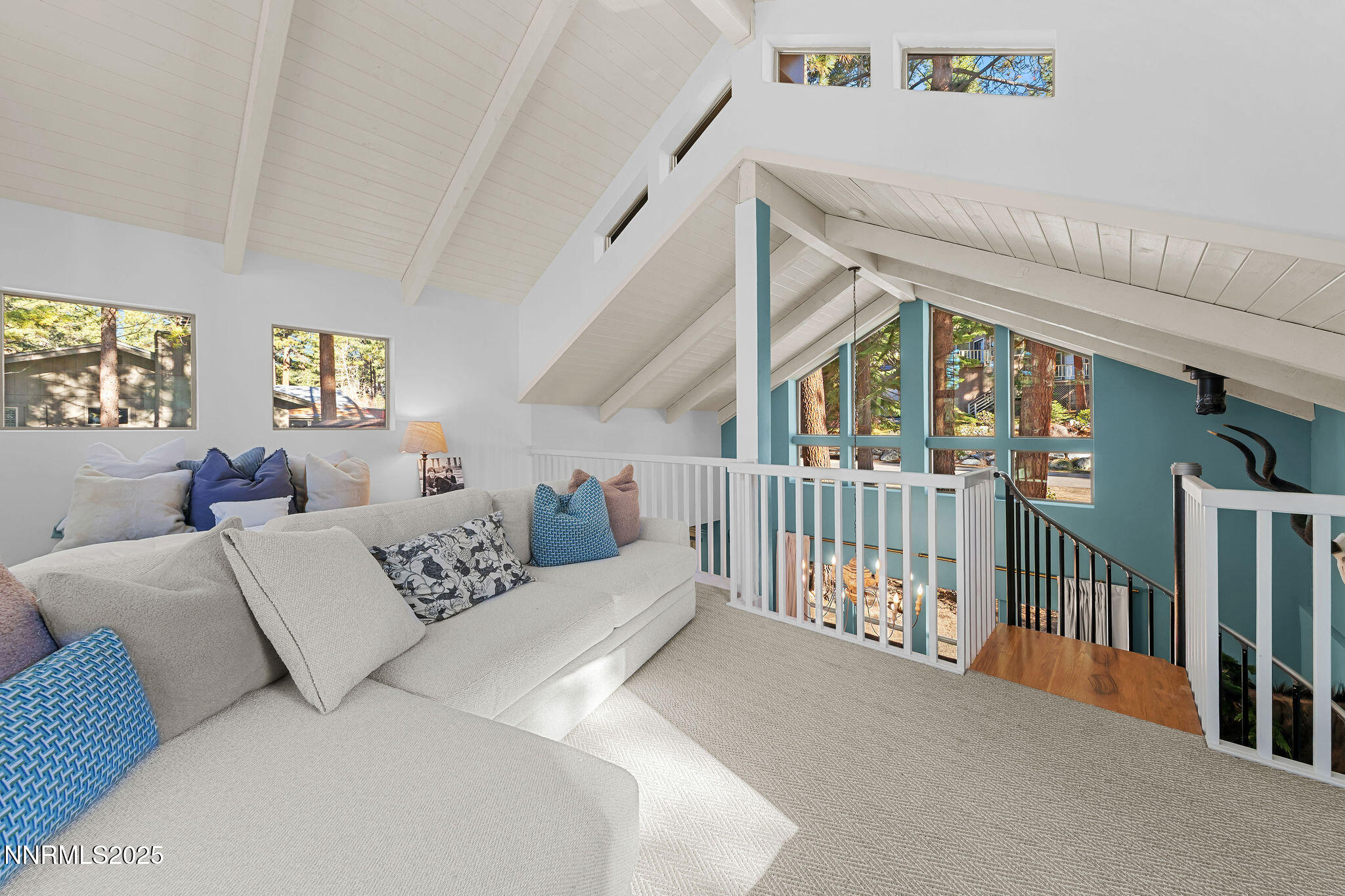 174 Hall Court Stateline, NV 89449 - Photo 20 of 40 a living room with furniture or baby crib and a couch