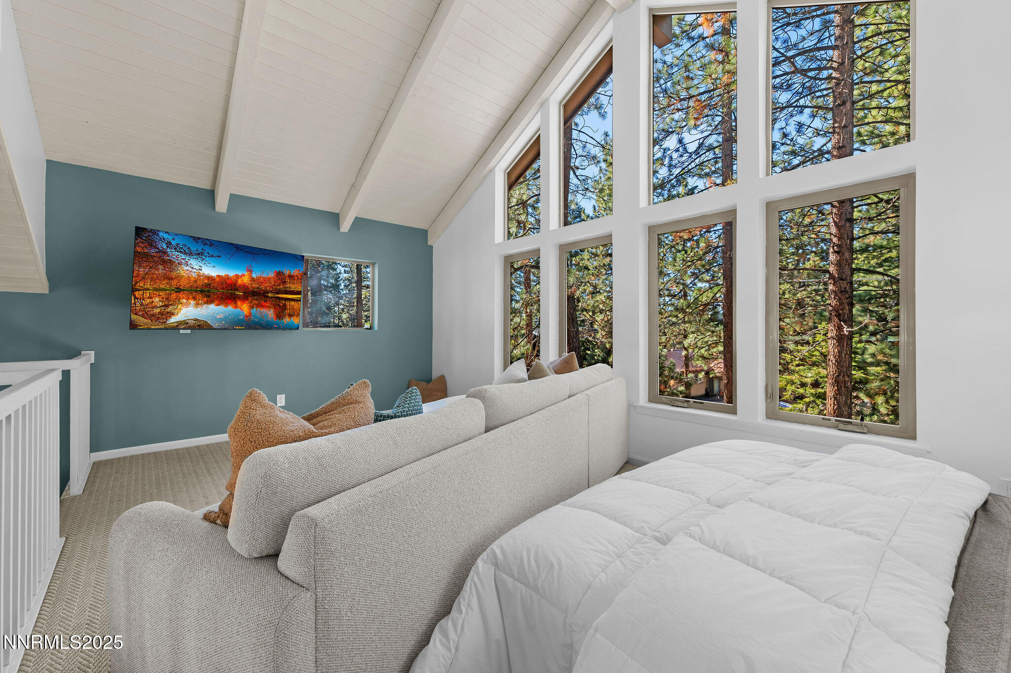 174 Hall Court Stateline, NV 89449 - Photo 22 of 40 a bedroom with furniture and a flat screen tv