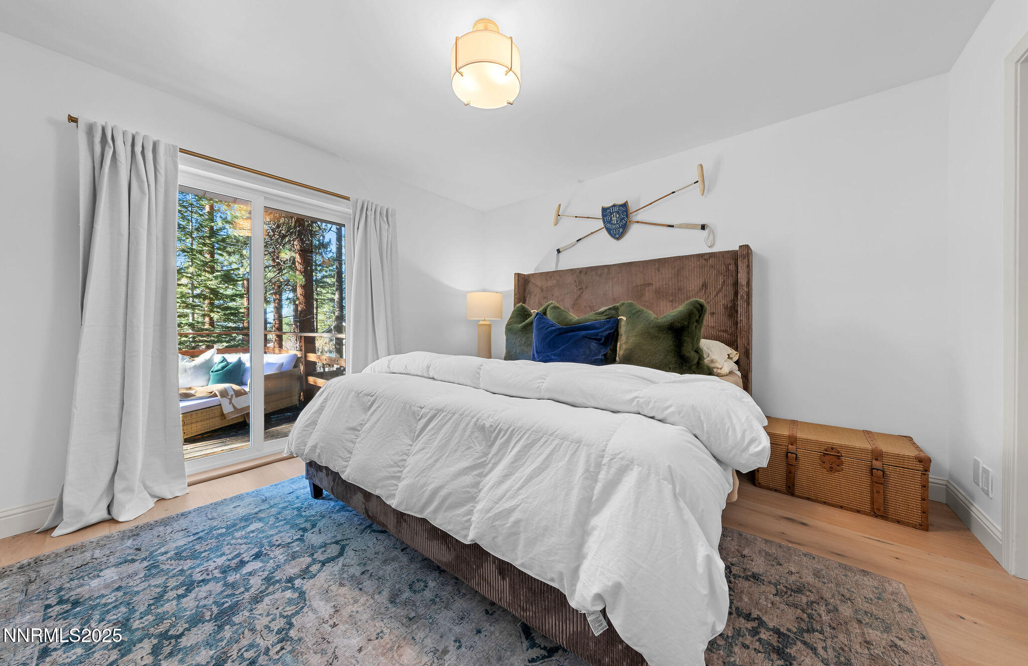 174 Hall Court Stateline, NV 89449 - Photo 23 of 40 a bedroom with a large bed and a window