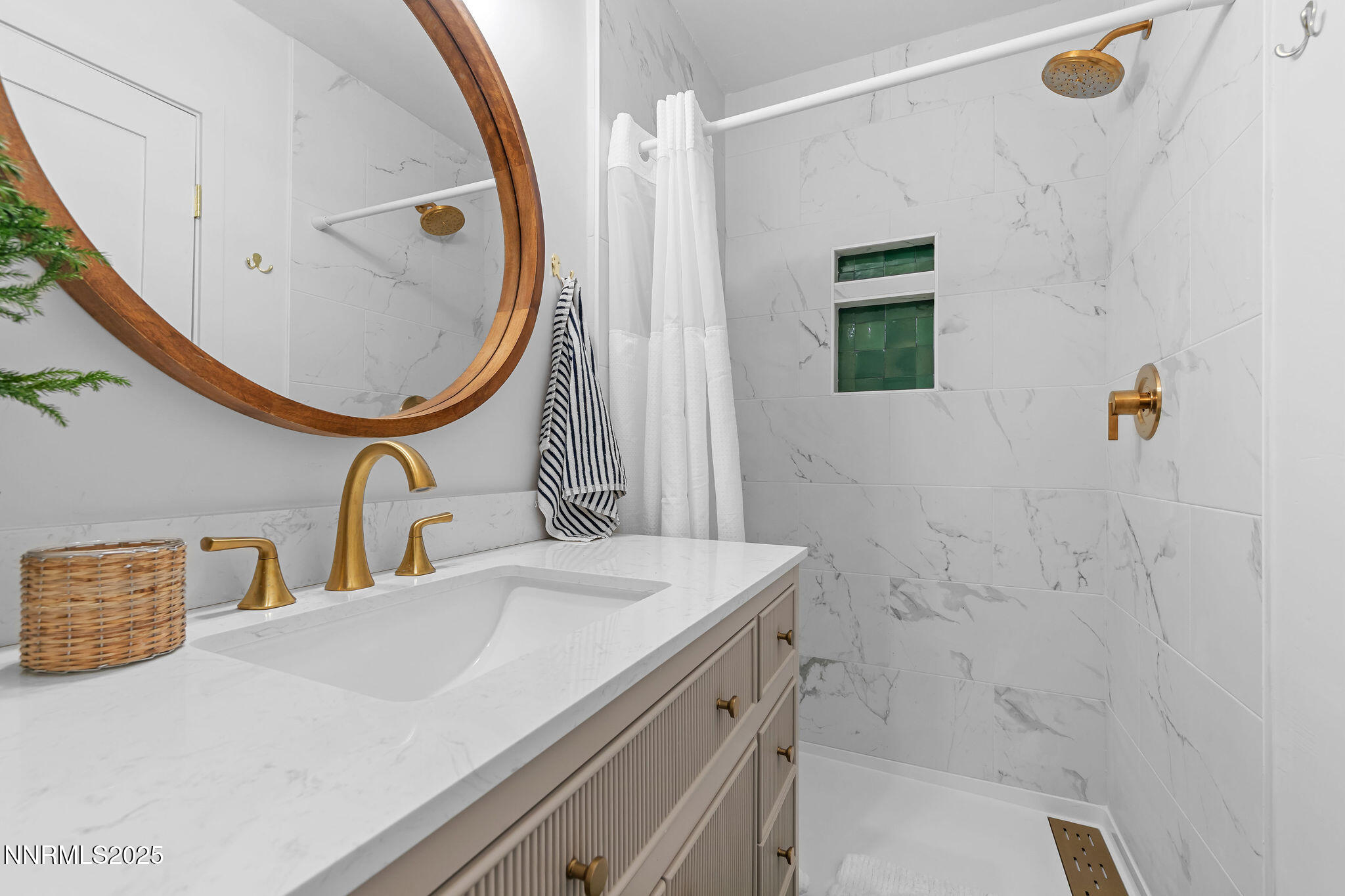 174 Hall Court Stateline, NV 89449 - Photo 30 of 40 a bathroom with a sink and a mirror