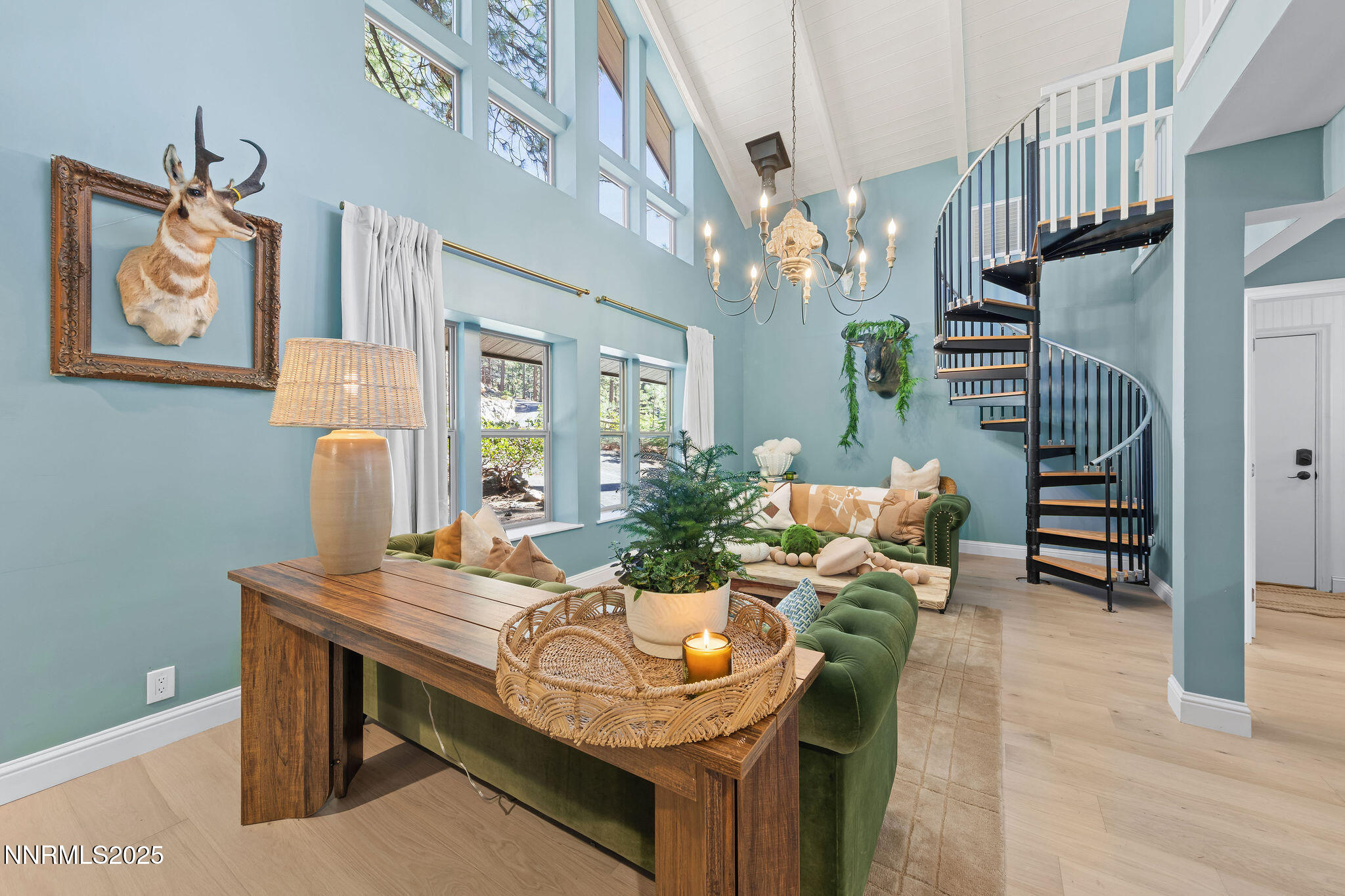 174 Hall Court Stateline, NV 89449 - Photo 3 of 40 a living room with furniture and a chandelier