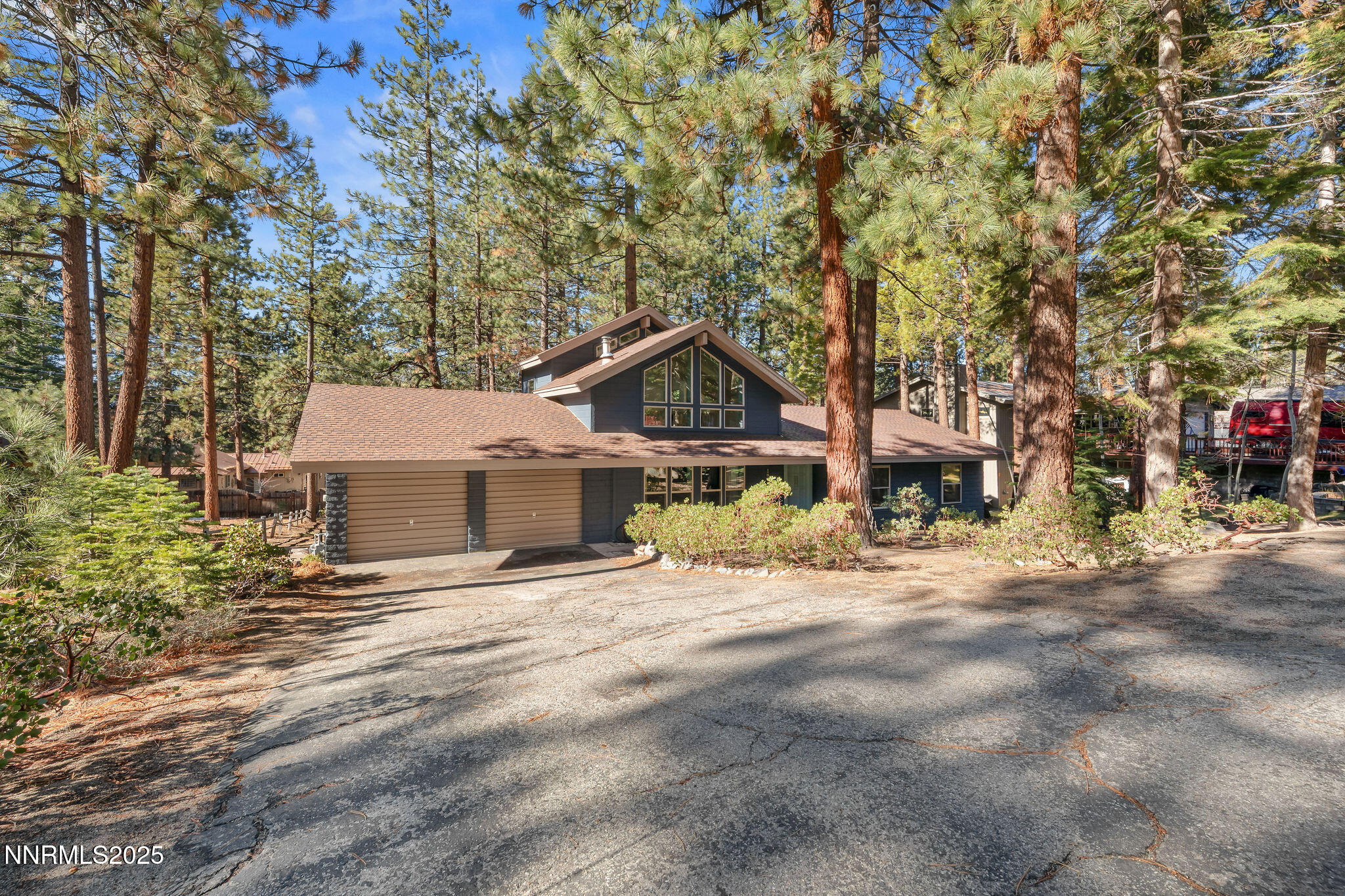 174 Hall Court Stateline, NV 89449 - Photo 33 of 40 a view of a house with a tree in front of it