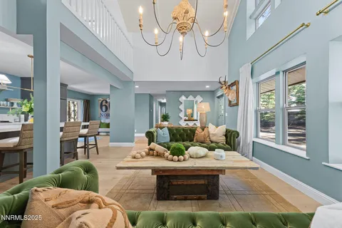 a living room with furniture and a table