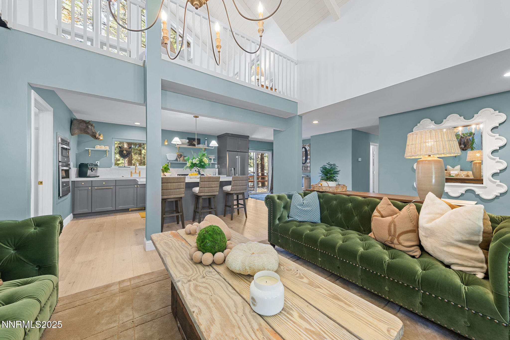 174 Hall Court Stateline, NV 89449 - Photo 7 of 40 a living room with furniture and a chandelier