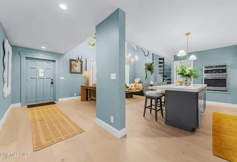 a very nice looking living room with a large window
