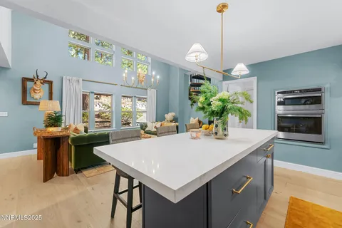 a view of kitchen island and living room