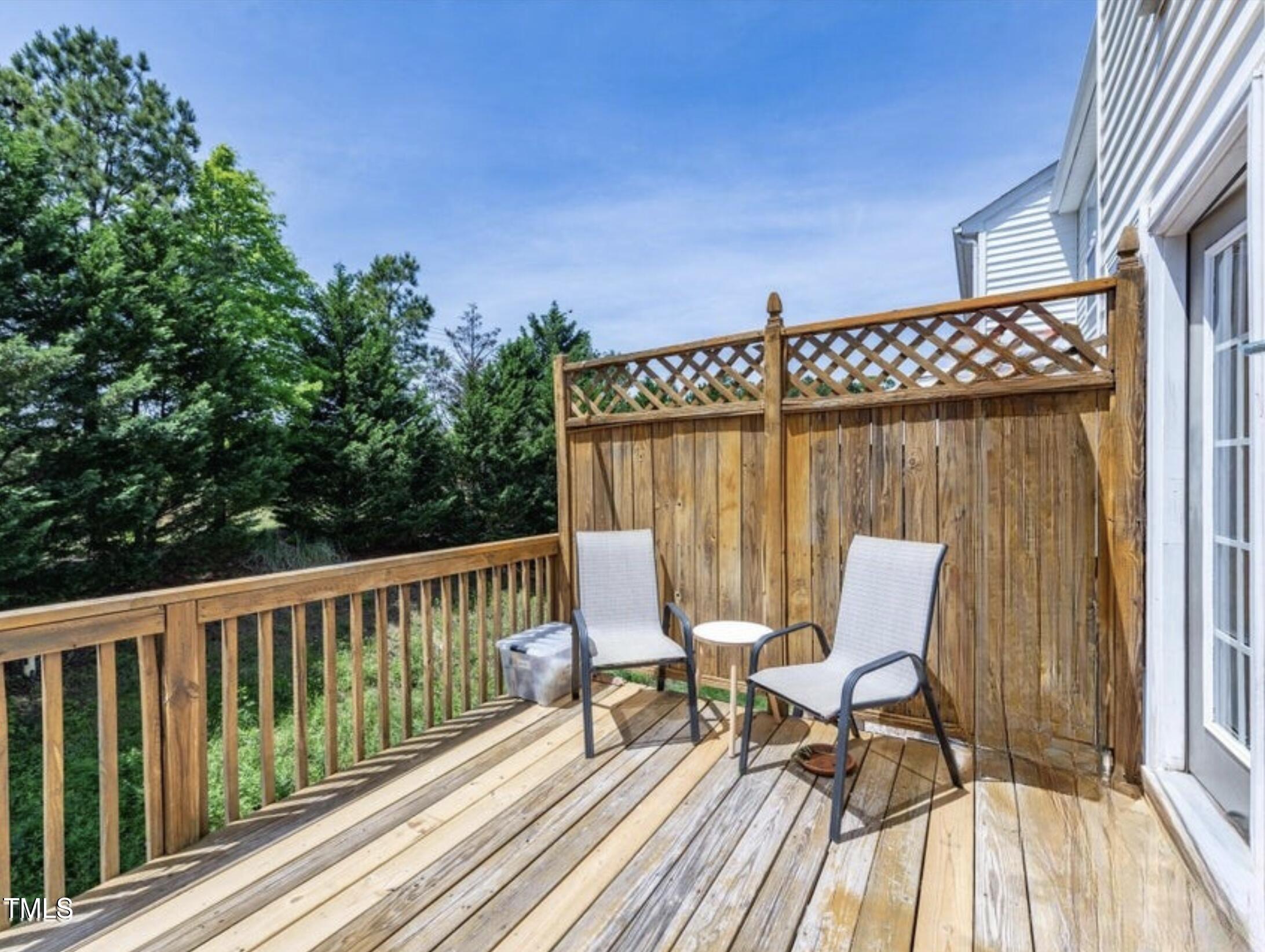 216 Ruby Walk Drive Morrisville, NC 27560 - Photo 16 of 28 a roof deck with a table and chairs