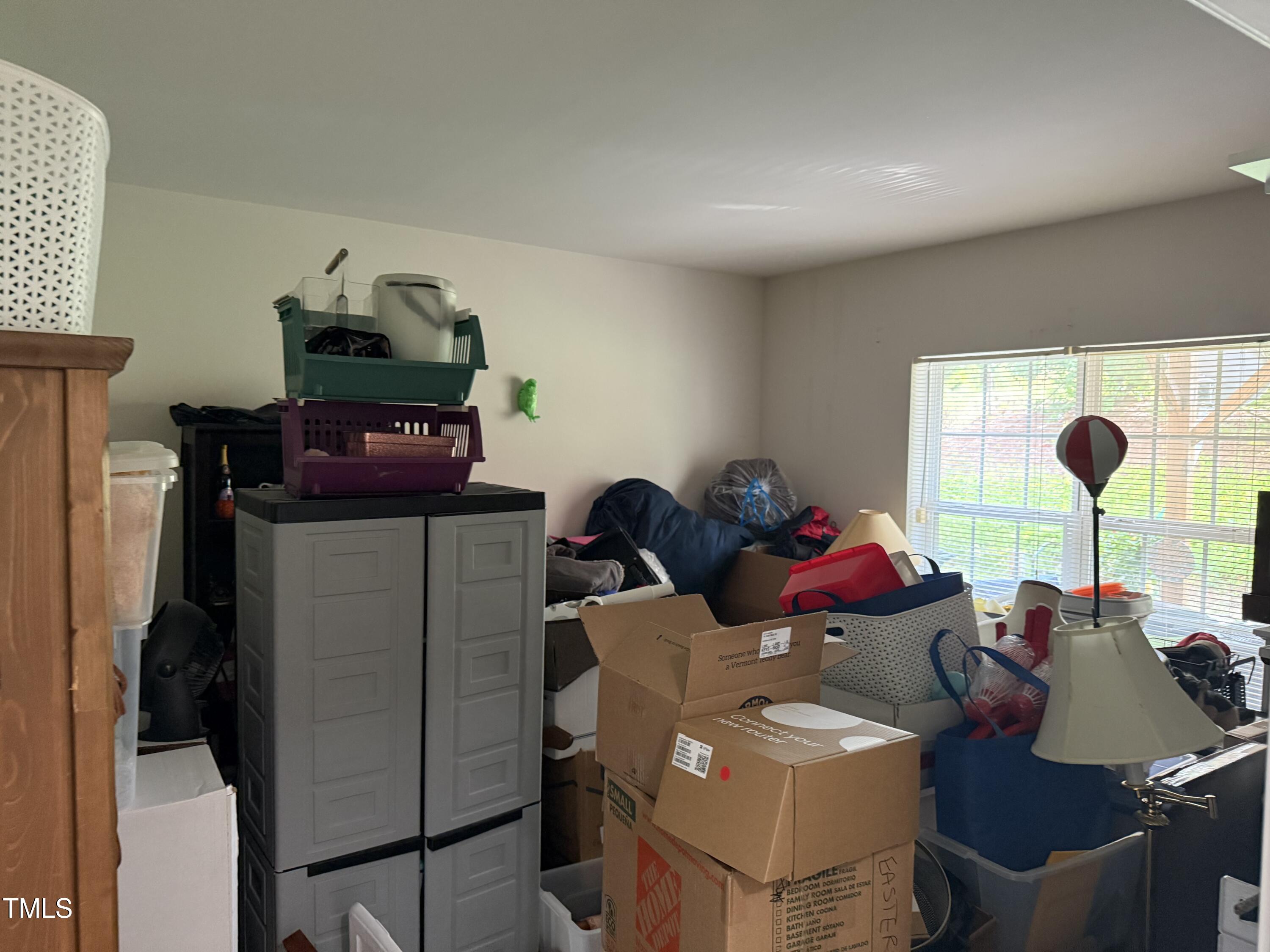 216 Ruby Walk Drive Morrisville, NC 27560 - Photo 4 of 28 a living room with furniture and a window