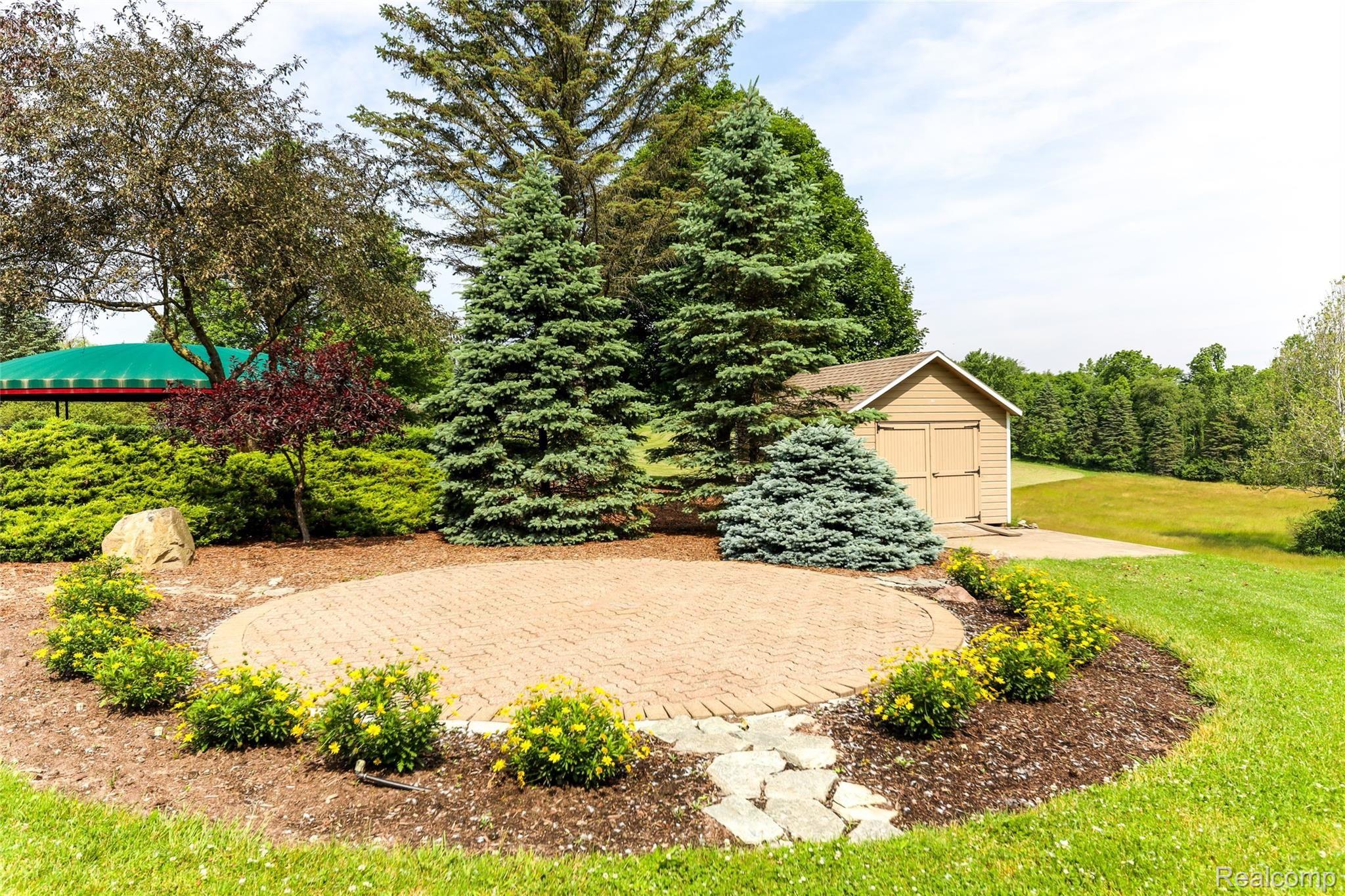 50450 Hanford Road Canton, MI 48187 - Photo 17 of 85 Additional brick paver patio provides more seating options.