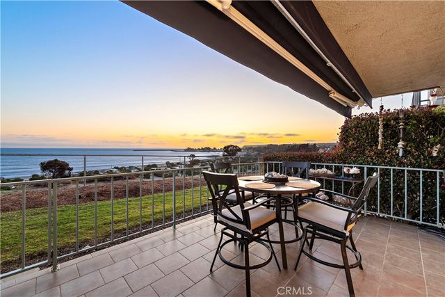 a front view of a house with a garage