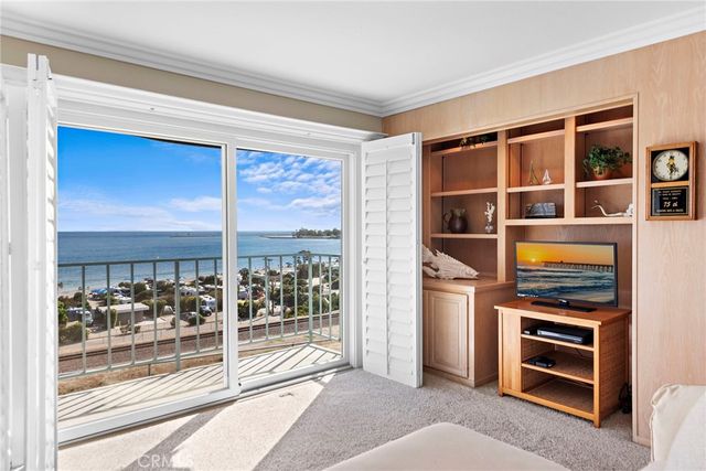 a front view of a building with many windows