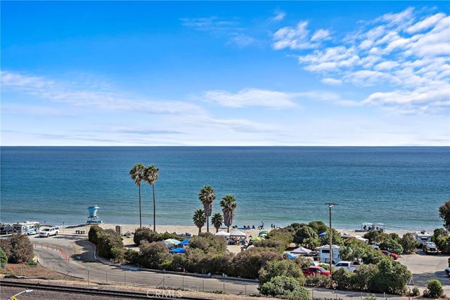 a view of a house with a street