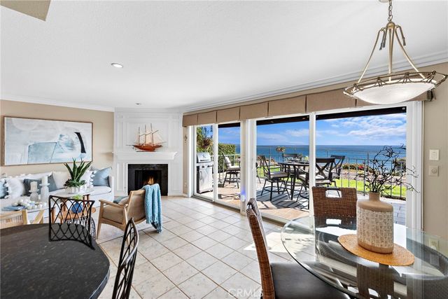 a view of a chairs and table on the terrace