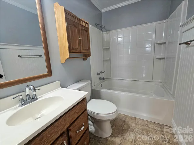 a bathroom with a sink a toilet and a bathtub