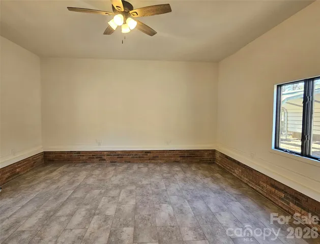 a view of an empty room and window