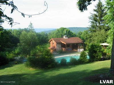 0 Fiddletown Road Kunkletown, PA 18058 - Photo 3 of 10 a view of a big house with a big yard potted plants and large tree