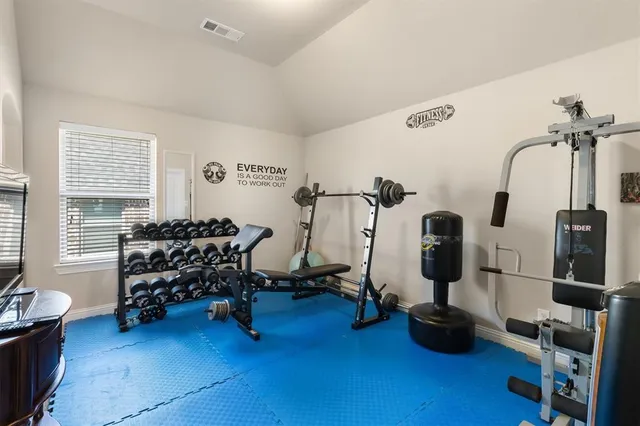 a view of a room with gym equipment