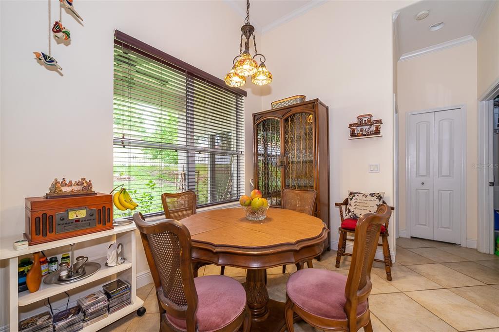 1607 Oak Hollow Road Clermont, FL 34711 - Photo 11 of 30 a dining room with furniture and window