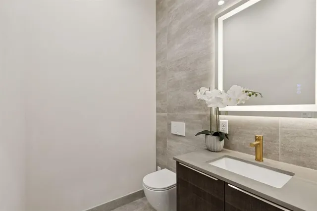 a bathroom with a sink and a toilet